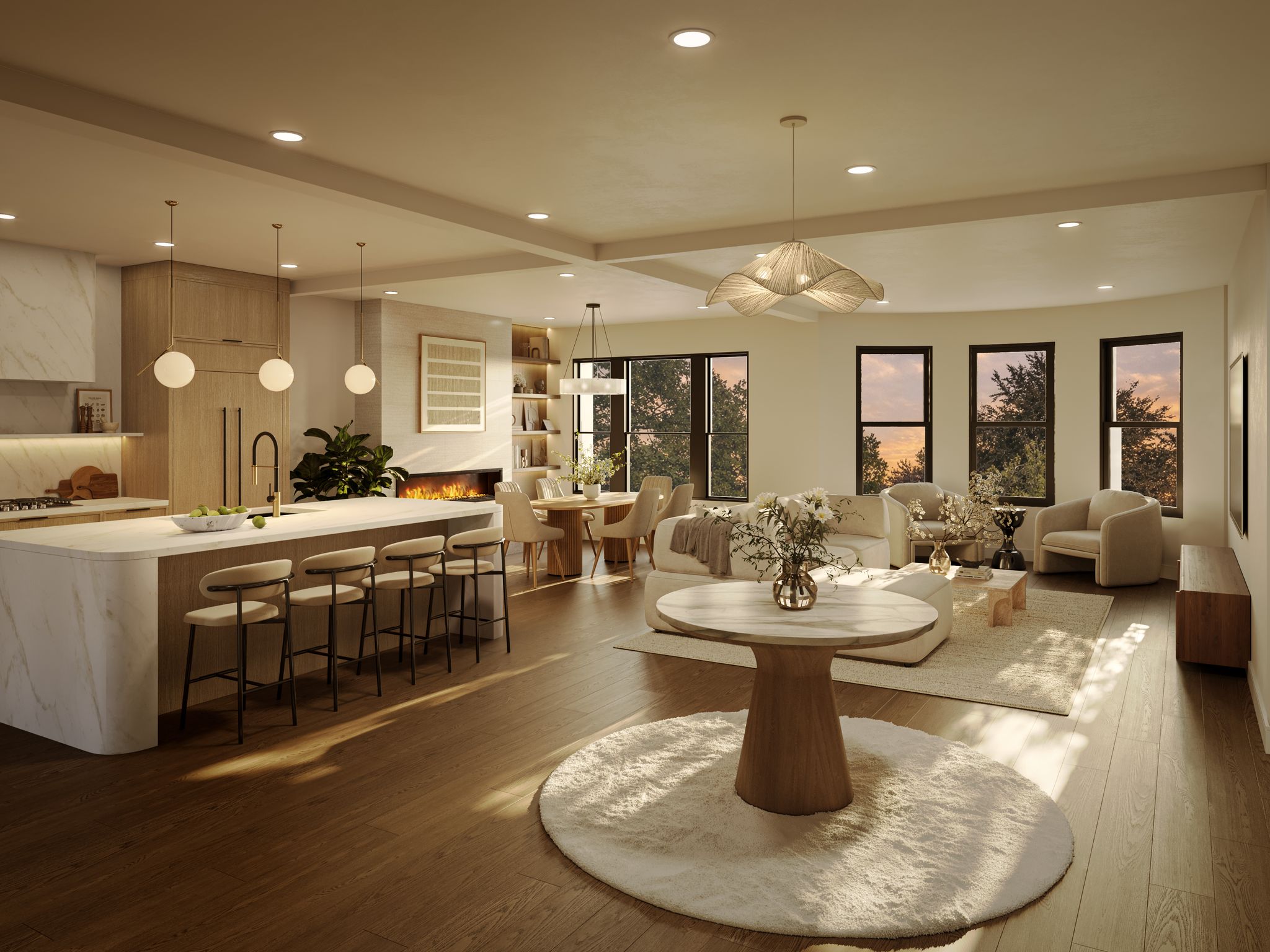 An open-concept living space features a kitchen with an island, a dining area, and a living room with a fireplace and large windows at twilight.