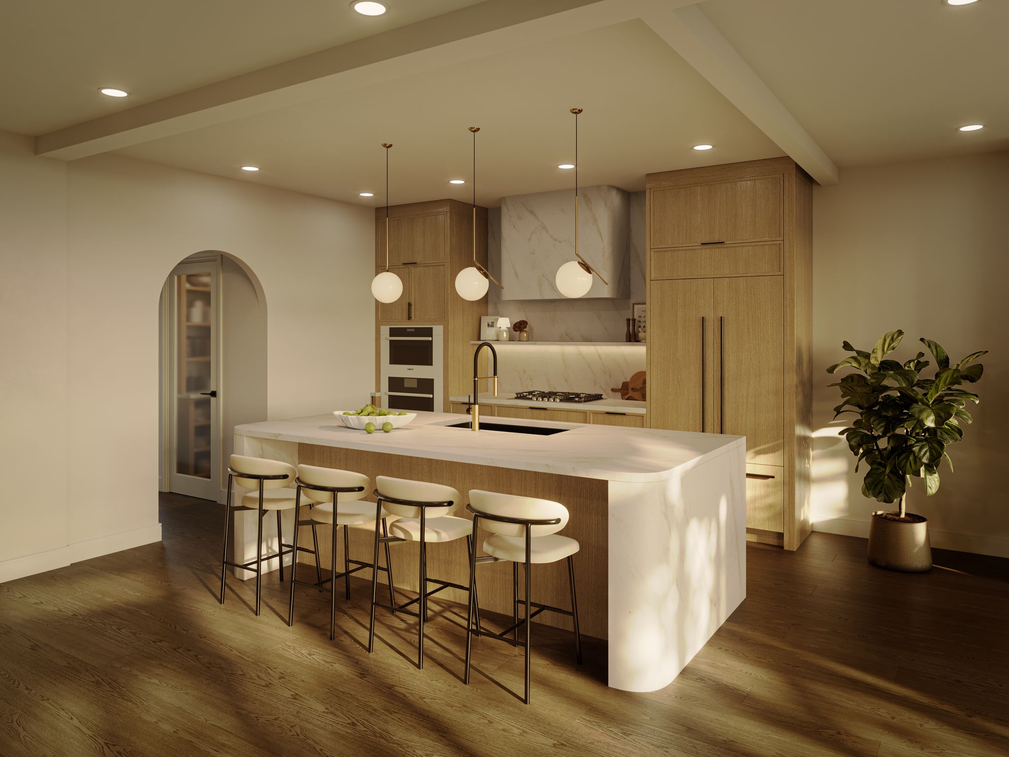 A modern kitchen with a large island, light wood cabinetry, recessed lighting, and an arched doorway leading to a pantry.